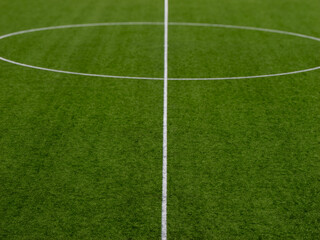Obraz premium Halfway line through center circle on football pitch