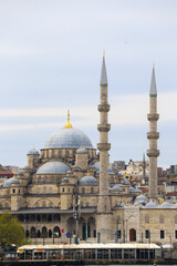 Fototapeta premium New Mosque minarets and dome in Eminonu district, Istanbul