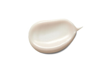 Cream smudge creating a cosmetic swatch, showing texture on a white background, ideal for beauty and skincare concepts