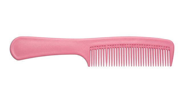 Pink plastic hair comb for grooming styling isolated on transparent background png professional tool shot.