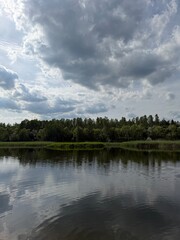 Obraz premium clouds over the river