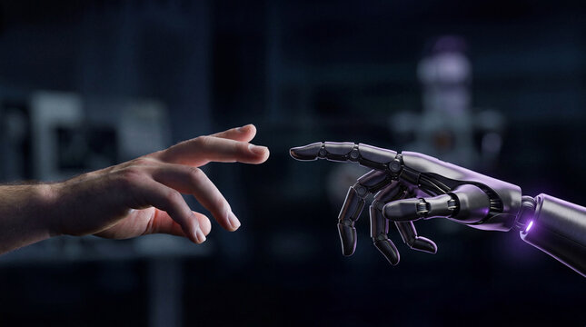 Human Hand And Robotic Hand Reaching Out To Touch In A Symbolic Gesture Of