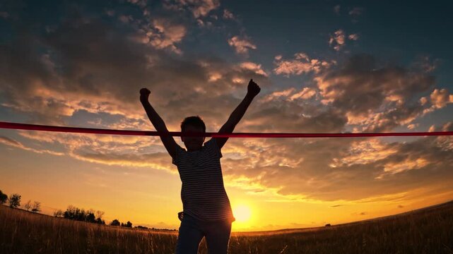 Child winner runs to finish line, victory, success. Children sports, nature. Boy runs to red finish line, lawn, silhouette. Active children running. Athletic Kid champion. Boy winner. Kid run in park