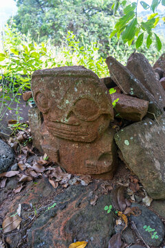 Tiki statue in the old cemetery of Atuona, Hiva Oa, French Polynesia