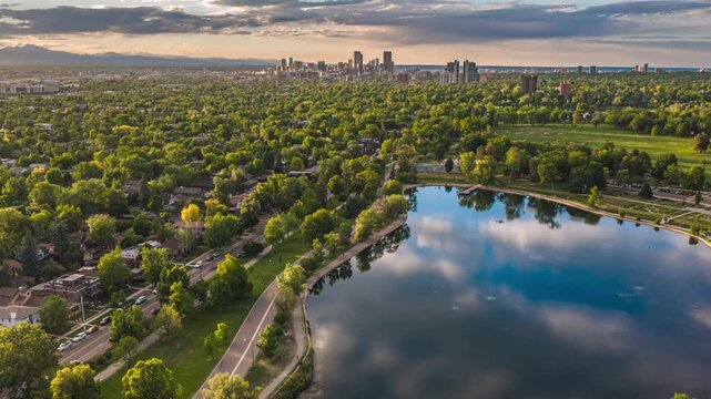 Sunset above Denver skyline green landscape drone hyperlapse Colorado 4K