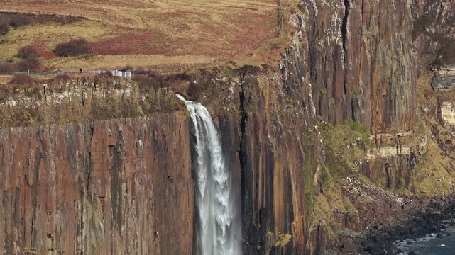 Mealt falls cascading over kilt rock cliff into the ocean on the isle of skye