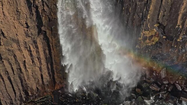 Mealt falls waterfall creating rainbow at kilt rock