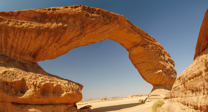 Rainbow Arch rock formation in desert landscape. Al Ula, Saudi Arabia