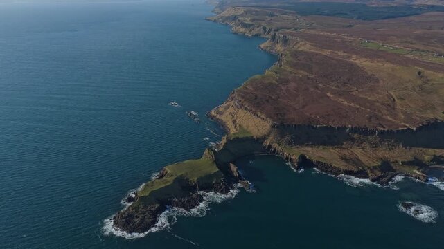 Aerial view of mealt falls and kilt rock on the isle of skye coastline