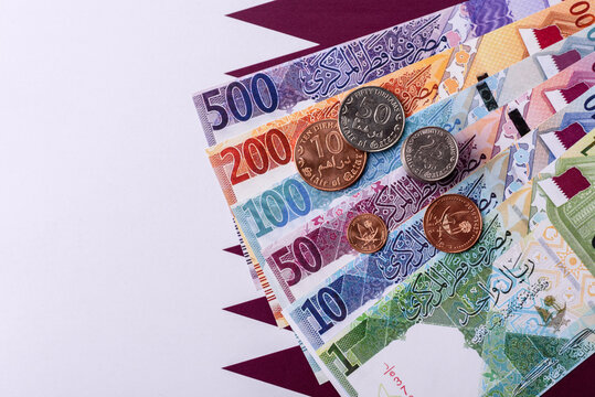 Qatar paper money, the Qatari riyal as a tool for financial transactions and trade. Qatari money