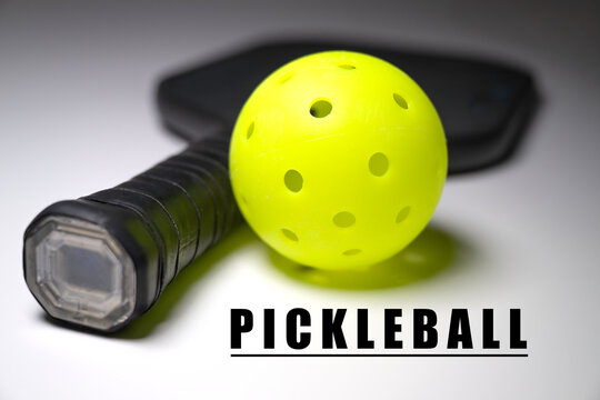 Pickleball and paddle. Pickleball is America's fastest growing sport. 