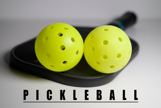 Pickleball and paddle. Pickleball is America's fastest growing sport. 