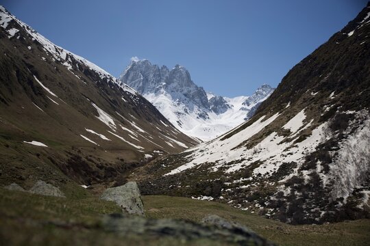 Glacial Valley Leading to Dramatic Snow Peaks in the Caucasus Georgia