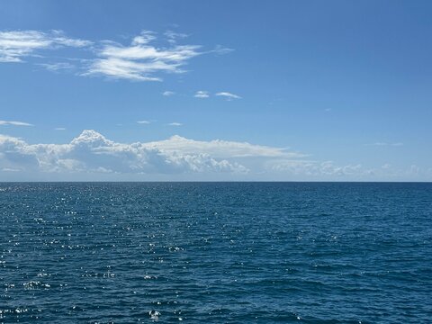 Open sea and blue sky in sunny day.