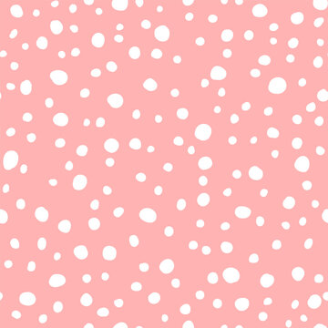 Vector seamless pattern with hand drawn polka dots. Cute design for textile, backgrounds, wallpaper, wrapping paper, digital prints.