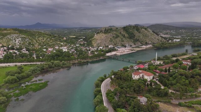 4K drone dramatic cinematic orbit of Rozafa Castle with real lightning strike in storm clouds, Albania