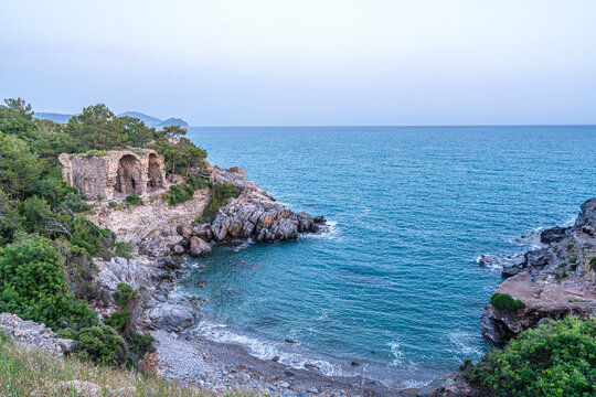 The scenic views of Aytap (iotape) is popular for camping, swimming in the natural caves, the local beaches, and the ancient ruins, located east of Alanya, in the Mediterranean Region, Turkey. 