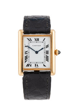 Cartier hand-wound watch, Tank model, reference 96019 with 18kt yellow gold case and white dial. Milan, Italy, March 13, 2026