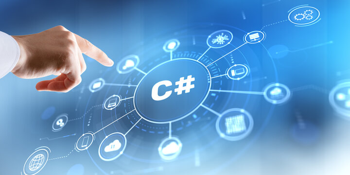 Software developer interacts with C# programming icon on modern IDE interface for application development