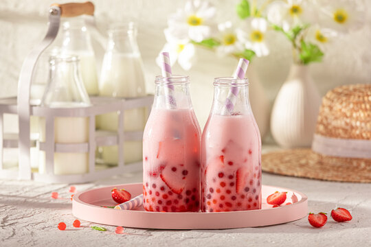 Cool and cold strawberry bubble tea with milkshake and balls.