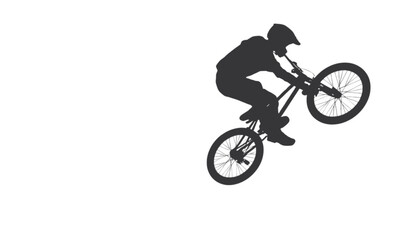 Obraz premium Biker silhouette executes a technical wheelie maneuver on a bicycle during a high energy performance.