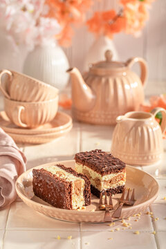 Tasty and sweet sponge cake with fluffy cream and glaze.