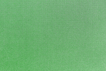 Fototapeta premium Green fabric texture background. Textile material closeup with diagonal weave pattern. Detailed cloth surface for fashion upholstery sewing and design projects with copy space