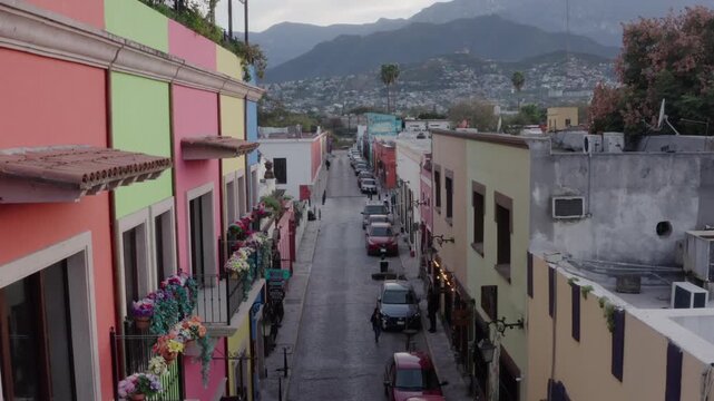 Vibrant El Barrio Antiguo street in Monterrey Mexico future World Cup host city with mountains
