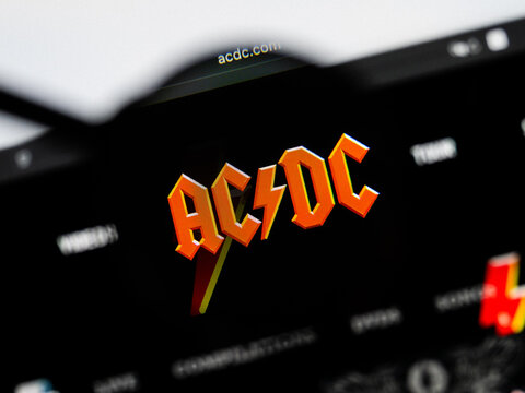 Milan, Italy 2026, 20 Apr Closeup of ACDC website on a laptop screen. ACDC logo under a magnifying glass.