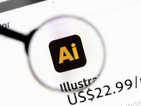 Milan, Italy 2026, 20 Apr Closeup of Adobe Illustrator website on a laptop screen. Adobe Illustrator logo under a magnifying glass.