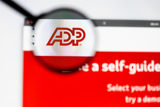Milan, Italy 2026, 20 Apr Closeup of ADP website on a laptop screen. ADP logo under a magnifying glass.