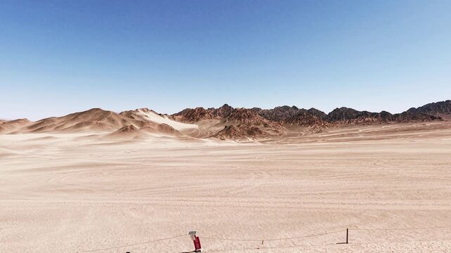 Heidu Mountain in Qinghai features stark black Yardang landforms, wind‑sculpted into surreal shapes across the arid plateau.