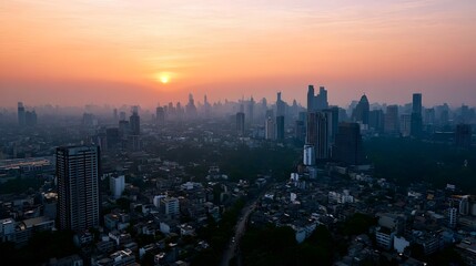 Fototapeta premium A breathtaking urban cityscape unfolds under the soft warm light of either sunrise or sunset creating a dramatic and serene atmosphere