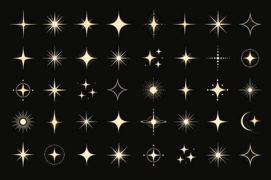 Collection of sparkling starbursts and light effects on a dark background