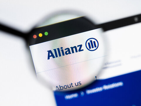 Milan, Italy 2026, 20 Apr Closeup of Allianz website on a laptop screen. Allianz logo under a magnifying glass.