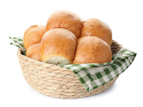 Freshly baked buns in wicker basket isolated on white