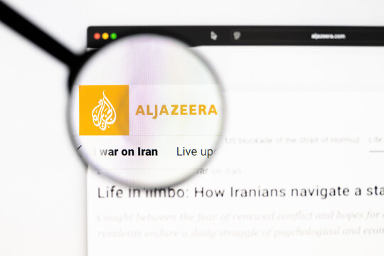 Milan, Italy 2026, 20 Apr Closeup of Al Jazeera website on a laptop screen. Al Jazeera logo under a magnifying glass.