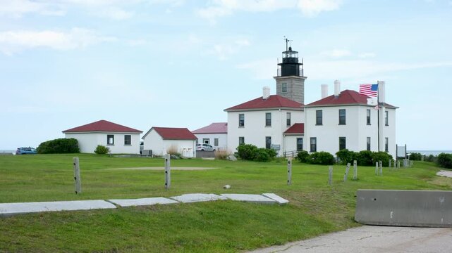 Rhode Island lighthouse station with American flag 