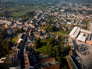 Obraz premium Aerial view of a riverside village in Flanders, Belgium