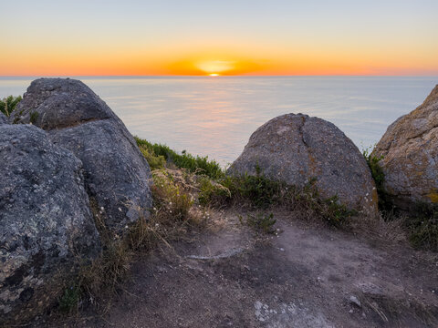 Sunrise over the horizon from Rosetta Head or The Bluff in South Australia