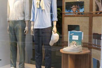 Naklejka premium display window with mannequins latest fashion designs at Luca Faloni, a men's clothing store, located at 130 Bloor St W, Toronto