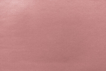 Fototapeta premium Soft pink textured background, ideal for design or creative projects.