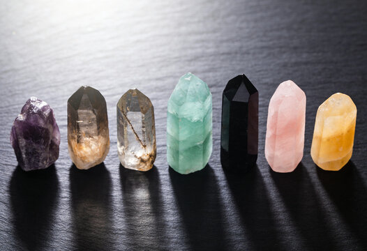 Healer crystal points set, mineral gemstones collection, polished quartz obelisk prisms, amethyst citrine fluorite obsidian stone, holistic wellness gemstone, spiritual chakra meditation crystal rods.