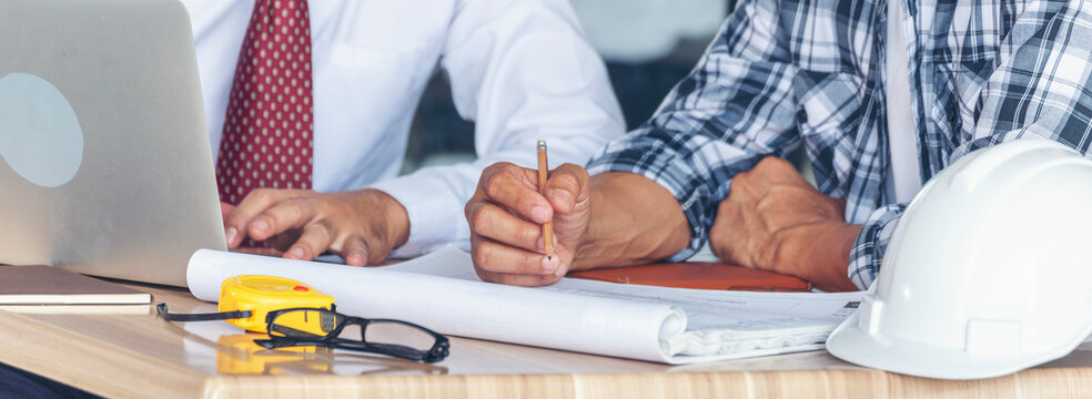Banner construction engineer office desk architect workplace. Diversity Coworker Engineer team hands partnership. Support team greeting teamwork colleagues with copy space. Banner Teamwork Warehouse