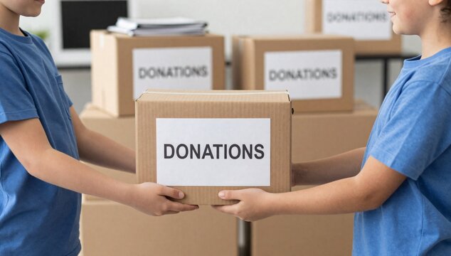 Children passing donation box to each other for charity work or community support