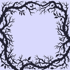 Fototapeta premium A dark silhouette of thorny branches forms a square frame border