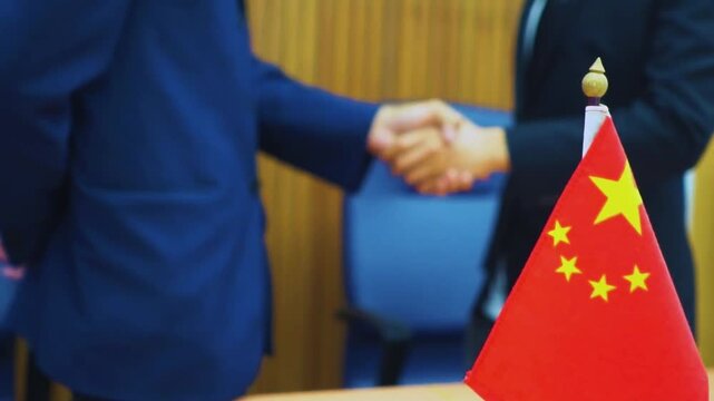 man holding a flag of  China 
