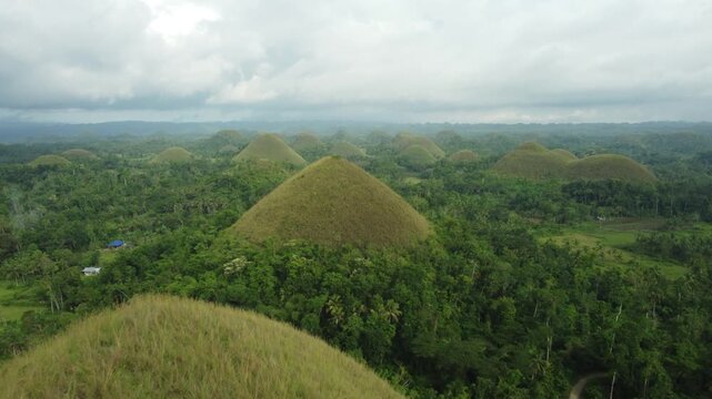 Aerial 4K drone footage of the iconic Chocolate Hills in Bohol.