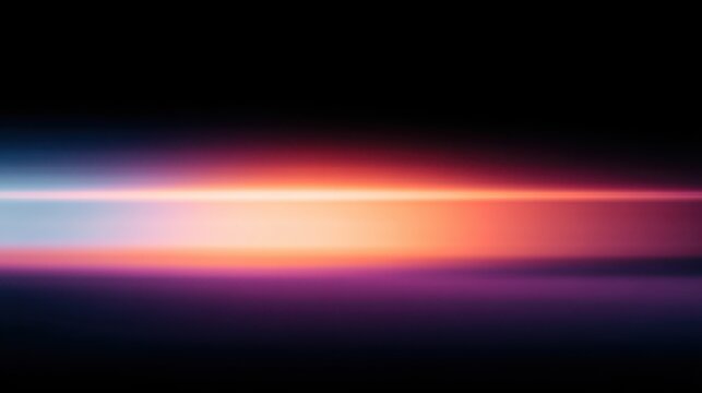 An abstract gradient of vibrant colors against a dark background.