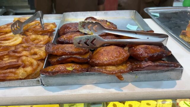 Khaja, jilebi and Malpua Bengali sweet dish sold in Kolkata, India